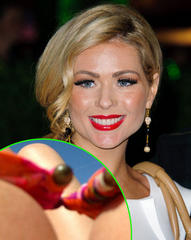 nicola mclean takes body surfing to extreme with close-up cleavage snap